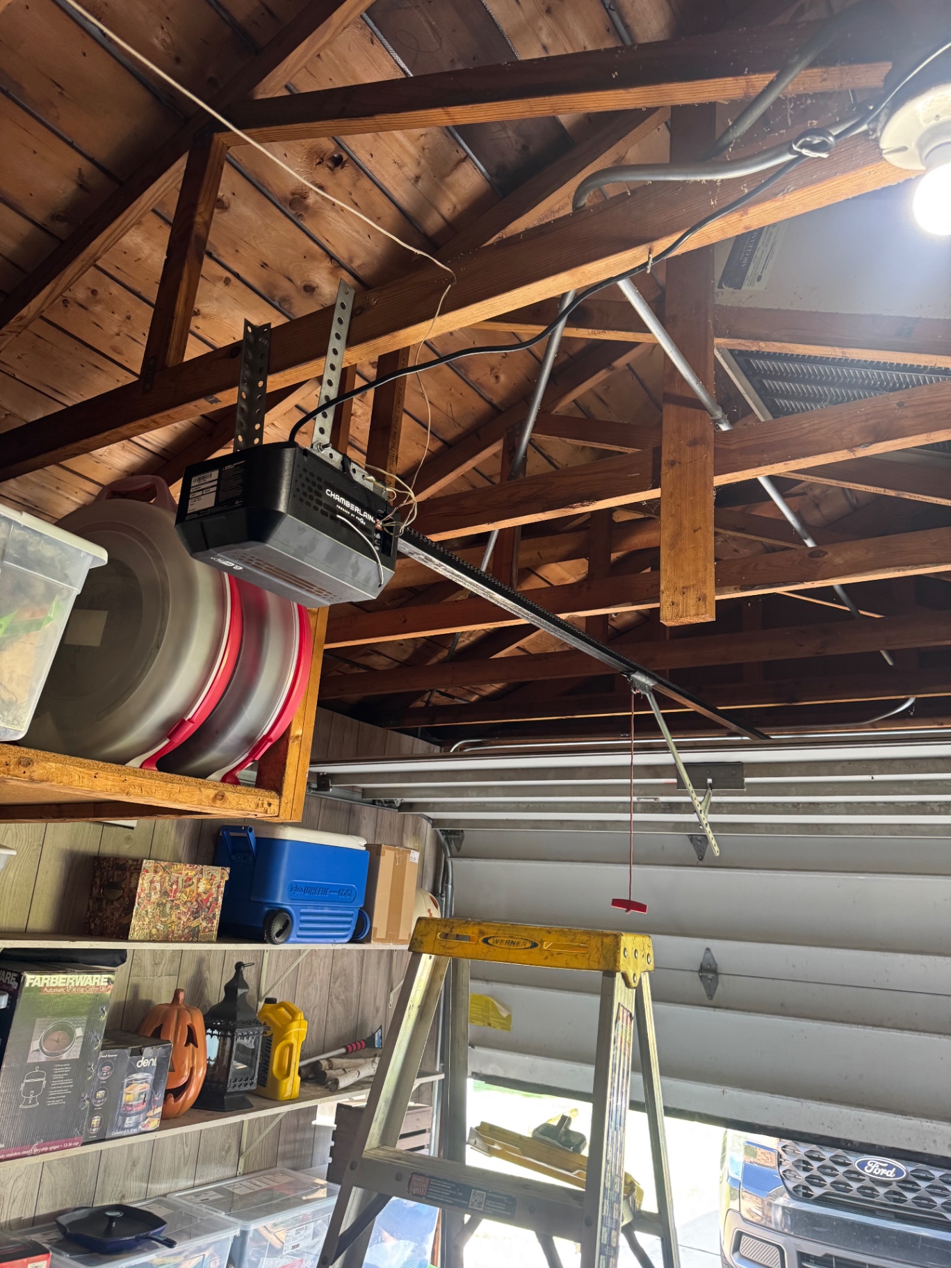 After — Old garage door opener replaced with new Chamberlain opener